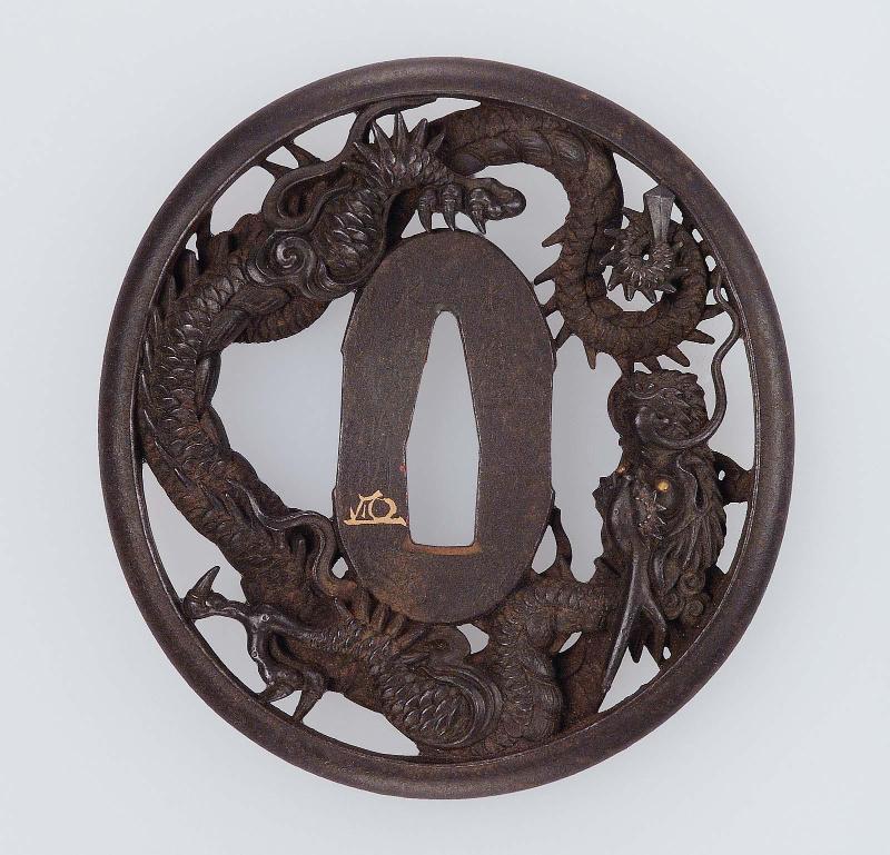 Tsuba with design of dragon and sword
