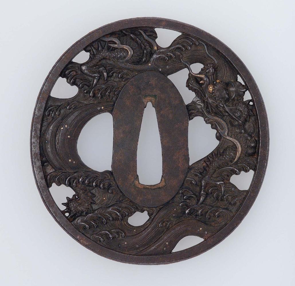 Tsuba with design of dragon and waves