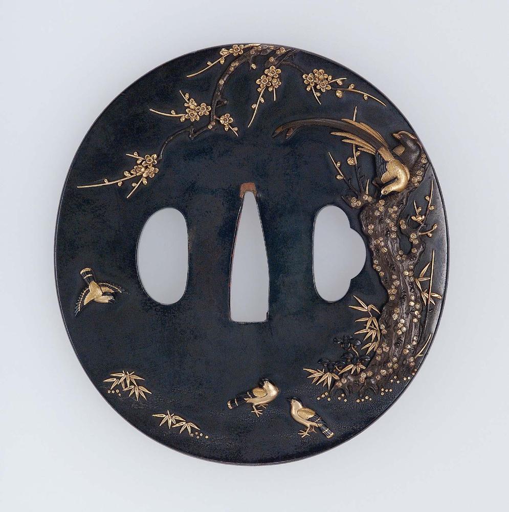 Tsuba with design of pheasants and other birds with a plum tree