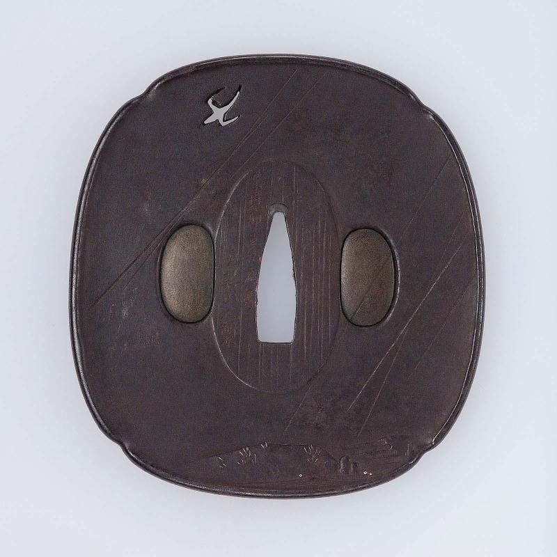 Tsuba with design of flying swallow and rain