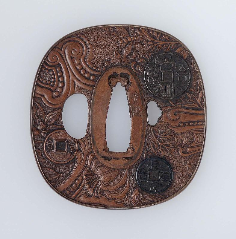 Tsuba with design of coins on a background imitating European embossed leather