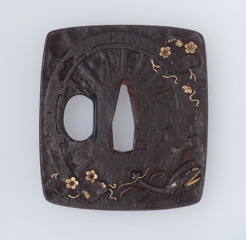 Tsuba with design of carriage wheels, mantis and vine