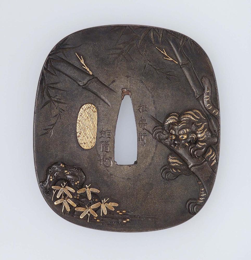 Tsuba with design of tiger and bamboo