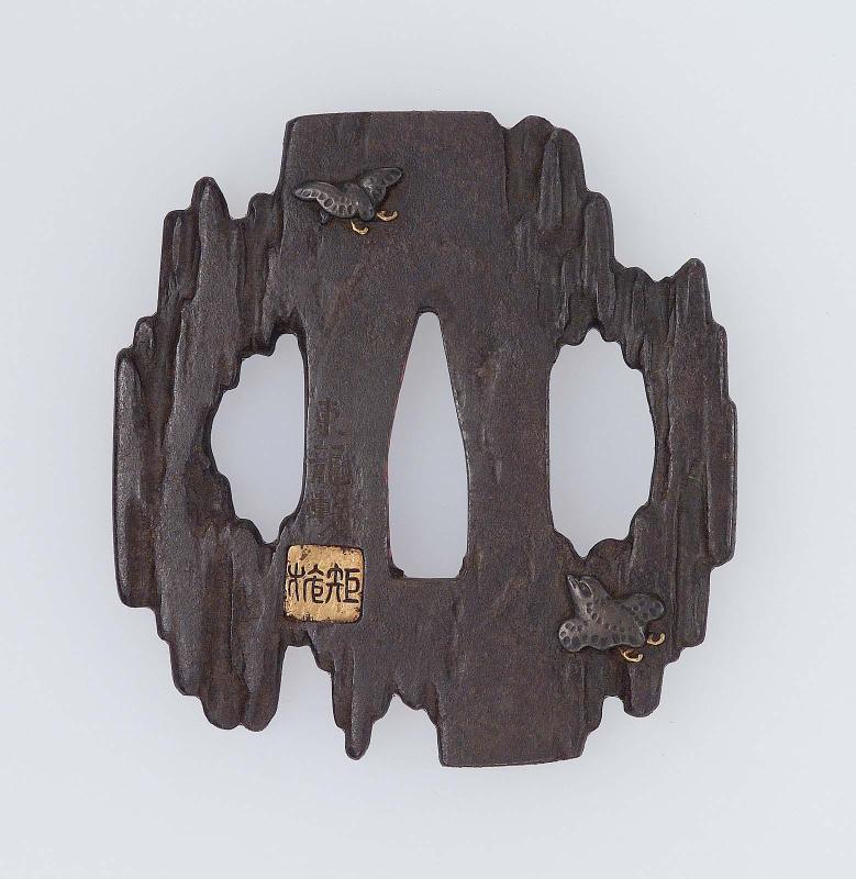 Tsuba in the form of a piece of rotten driftwood