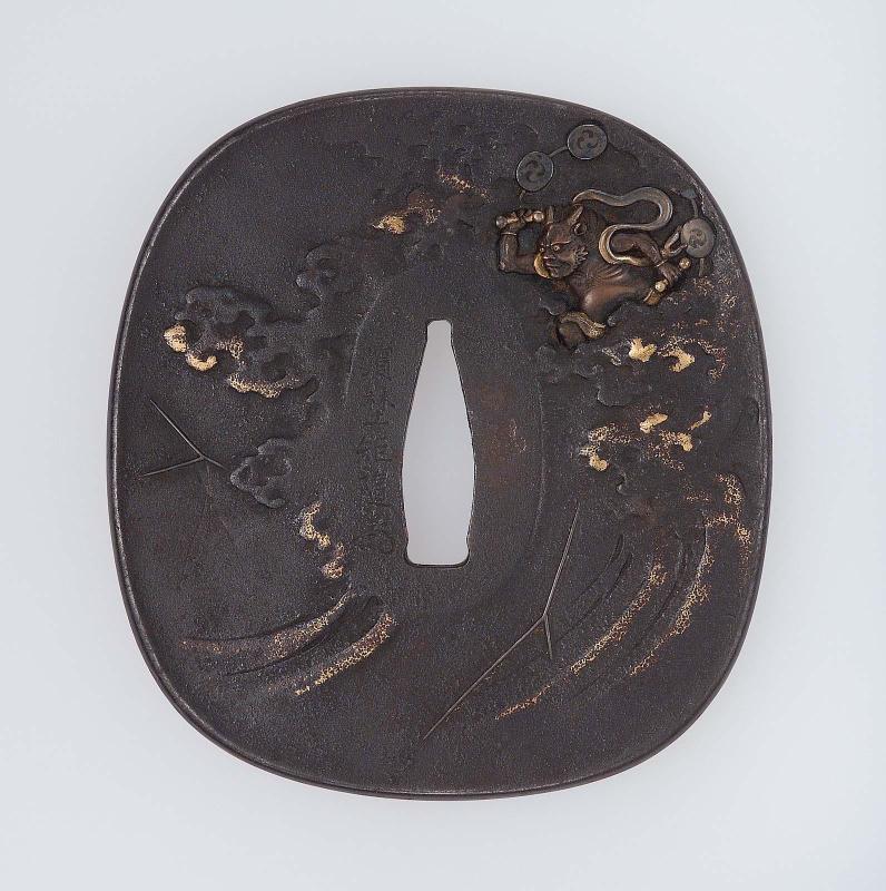 Tsuba with design of Raijin raising a storm