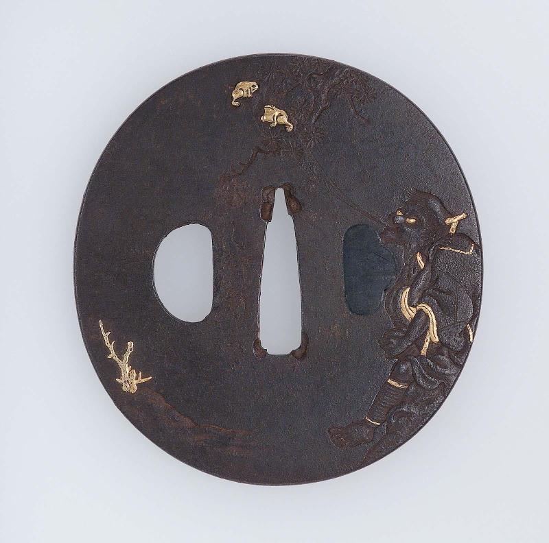 Tsuba with design of Gama Sennin exhaling two toads