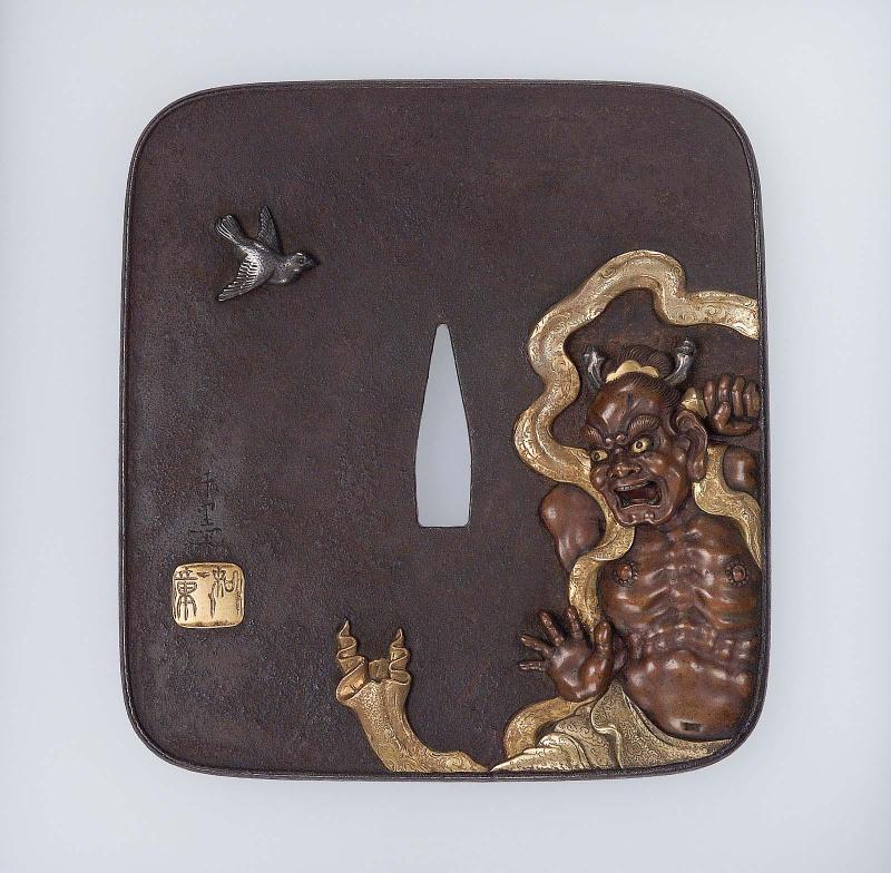 Tsuba with design of Nio and sparrows