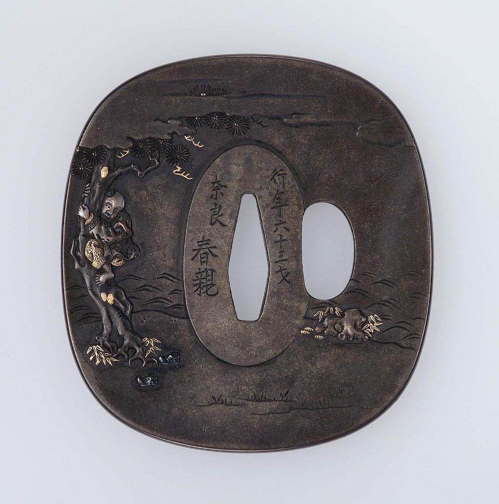 Tsuba with design of karako playing with scroll, trumpet, deer and rat