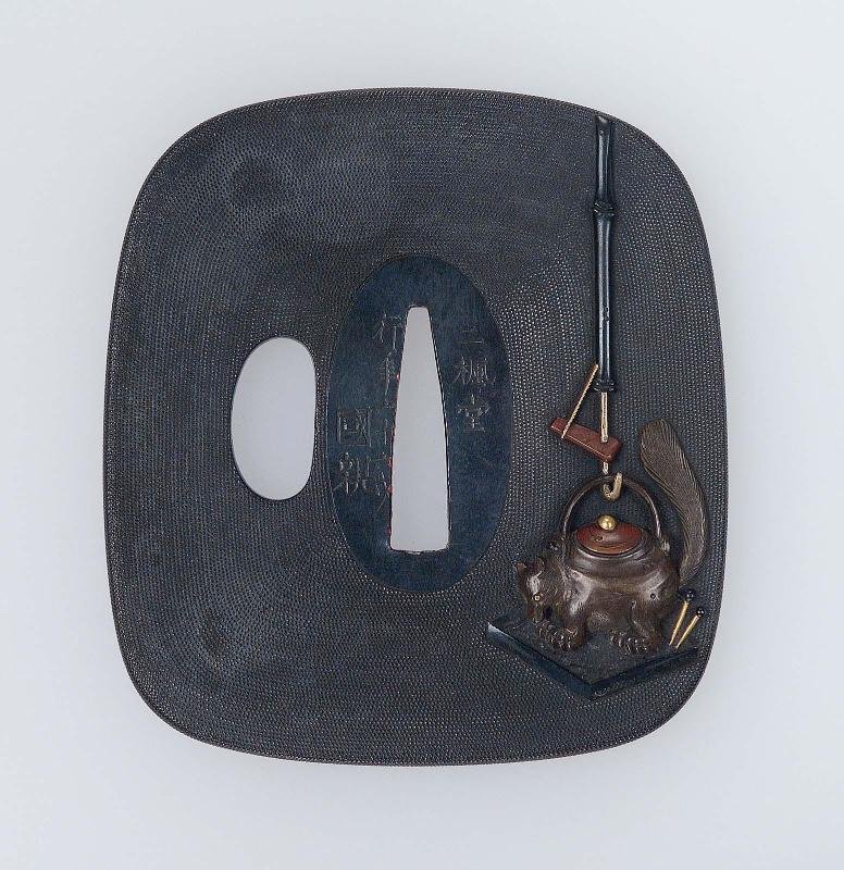 Tsuba with design of the Bunbuku Chagama story