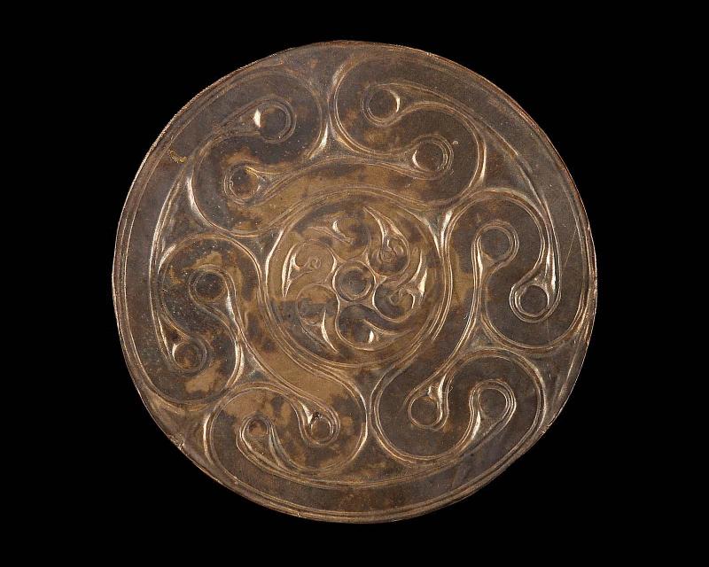 Reproduction of gold embossed disk