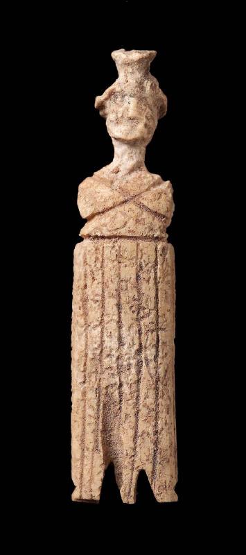 Small standing figure