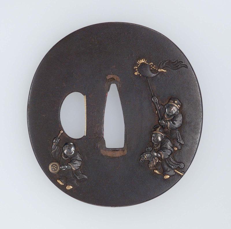 Tsuba with design of karako and toys