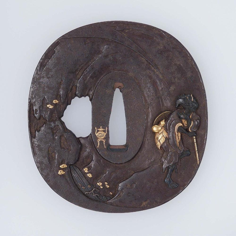 Tsuba with design of exhaling seninn and pine tree