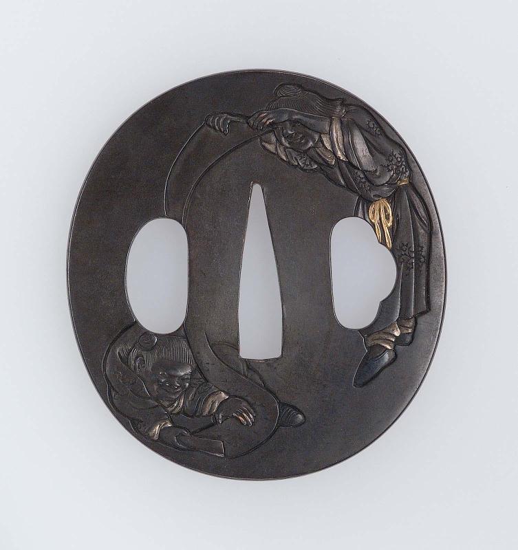 Tsuba with design of Kanzan and Jittoku playing with a scroll