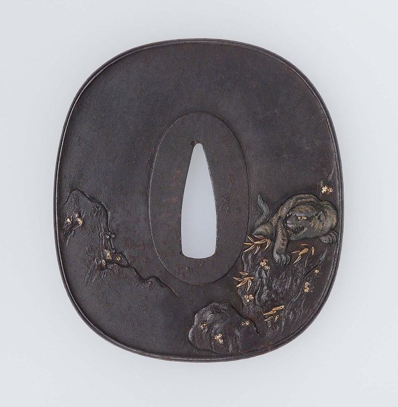 Tsuba with design of tiger on crag