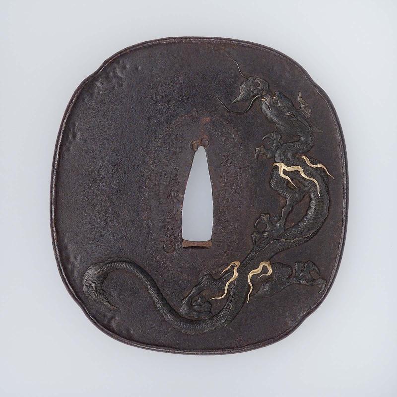 Tsuba with design of dragon and waves