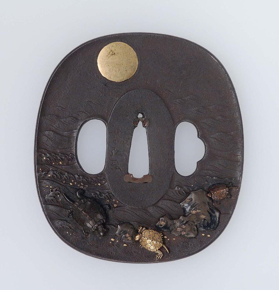 Tsuba with design of terrapins on a rocky beach