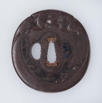 Tsuba in the form of Daikoku with his sack