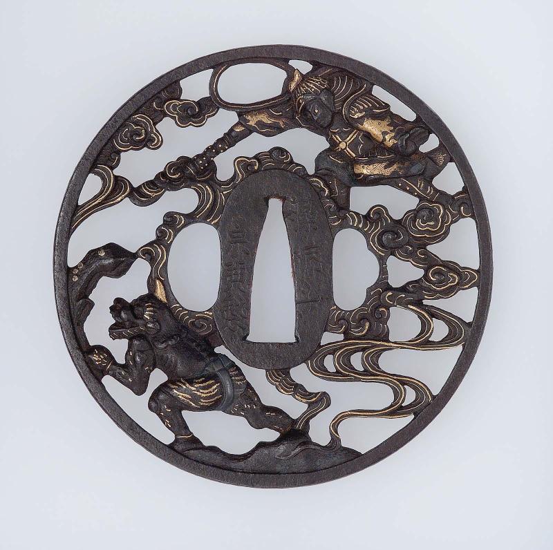 Tsuba with design of Idaten chasing an oni who has stolen his reliquary