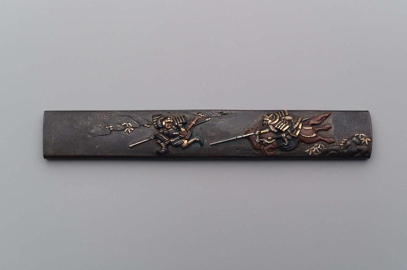 Kozuka with design of a mounted samurai in pursuit of another samurai on foot