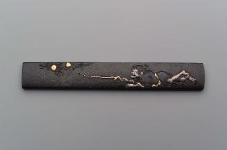 Kozuka with design of boy stealing peaches from a tree