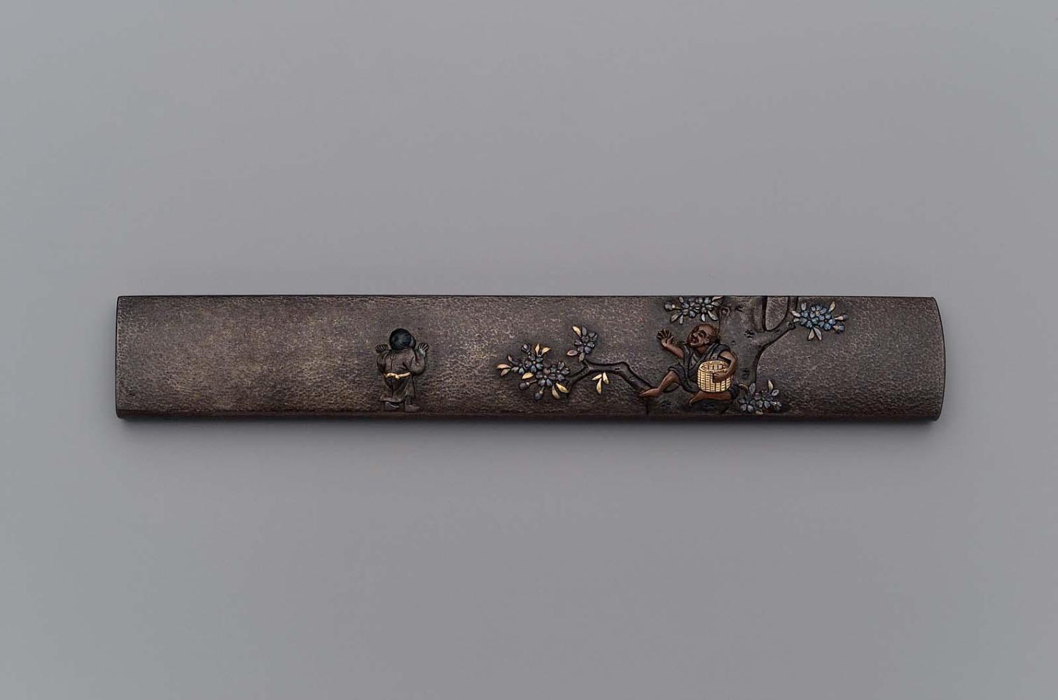 Kozuka with design of a man with a basket sitting in a cherry tree, with a boy looking on