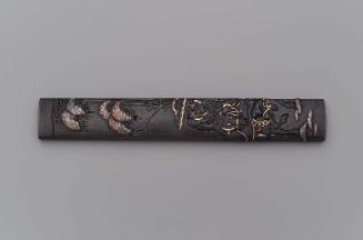 Kozuka with design of Toba riding into exile beneath snow-laden bamboo