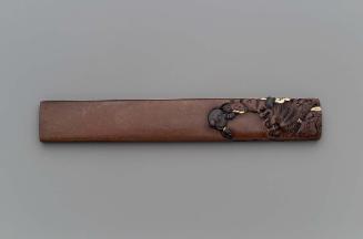 Kozuka with design of Fukurokuju and a Chinese boy