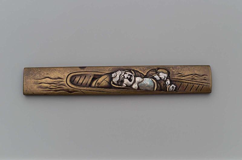 Kozuka with design of Hotei and a Chinese boy in a boat