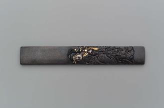 Kozuka with design of Seiobo holding a spray of peach