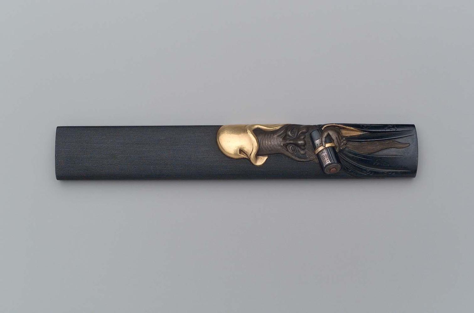 Kozuka with design of Fukurokuju with a scroll