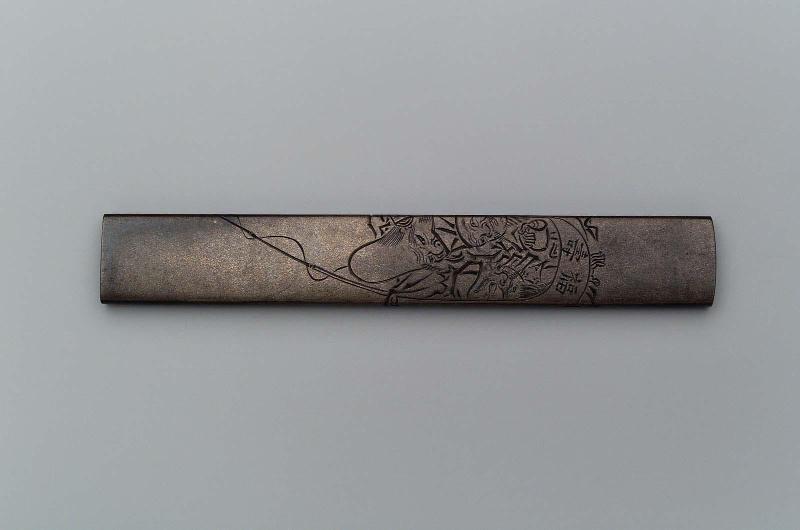 Kozuka with design of Ebisu, Daikoku and Fukurokuju reading a scroll