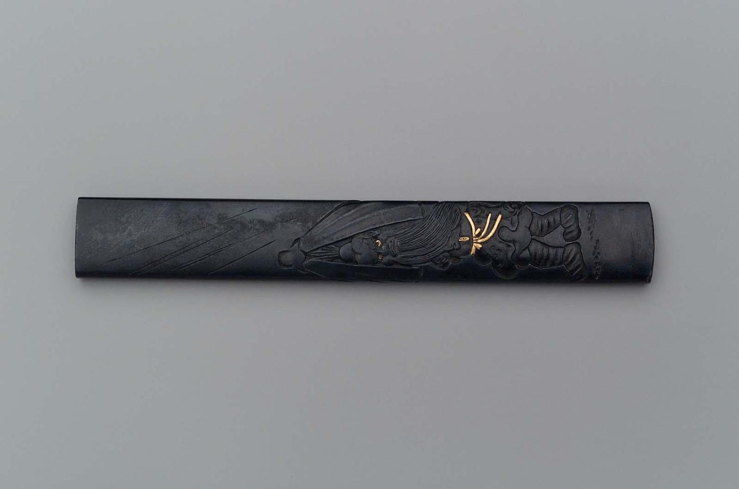 Kozuka with design of Shoki under an umbrella