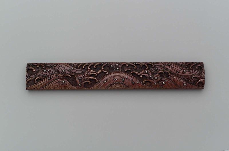 Kozuka with design of waves