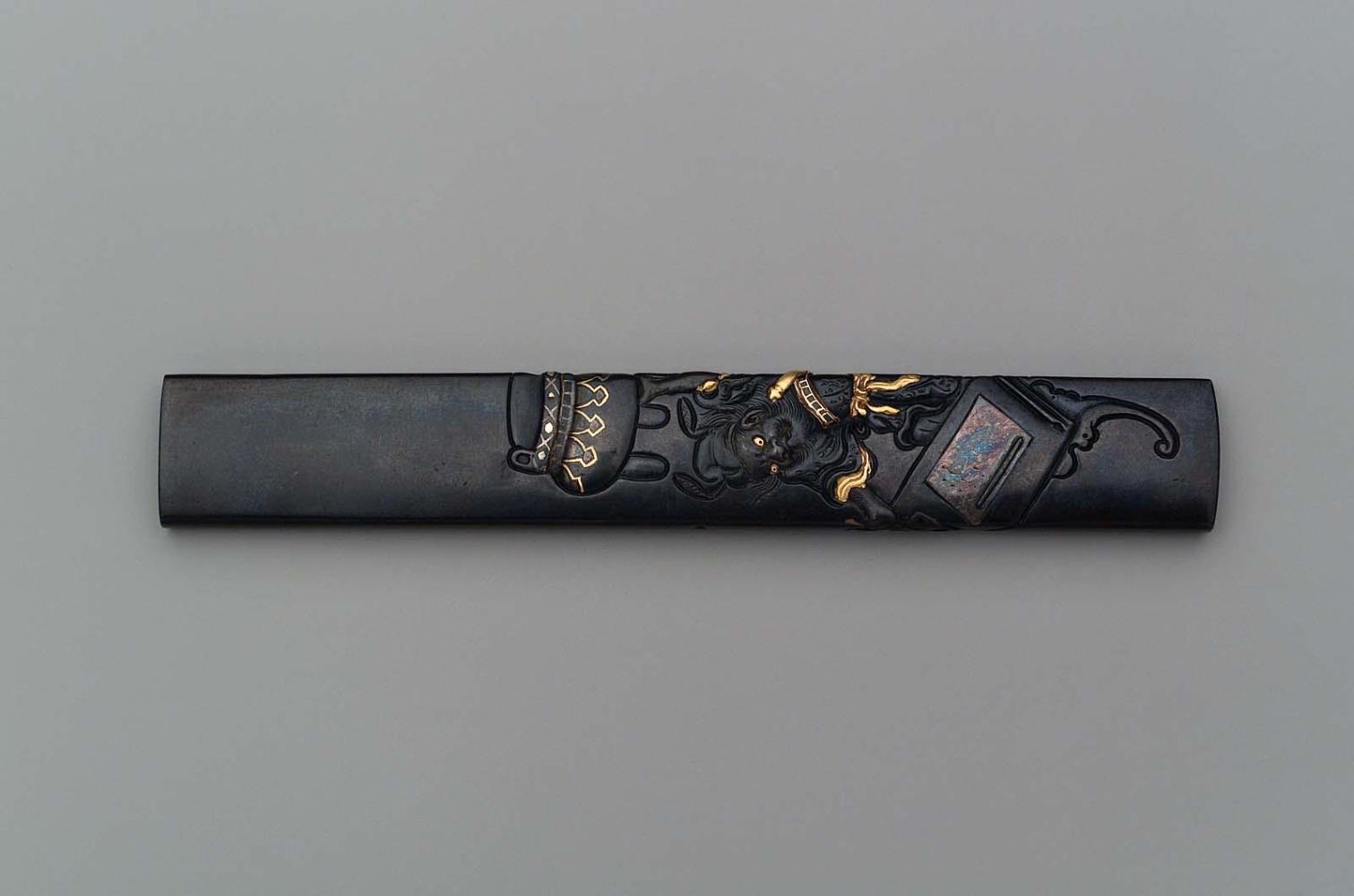 Kozuka with design of Goshisho (Wuzixu) holding a bronze tripod above his head and writing