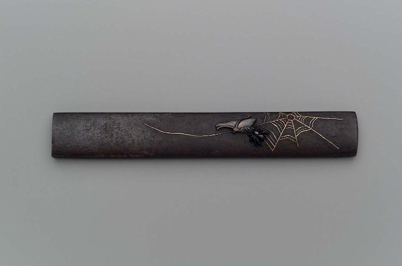 Kozuka with design of spider capturing a butterfly