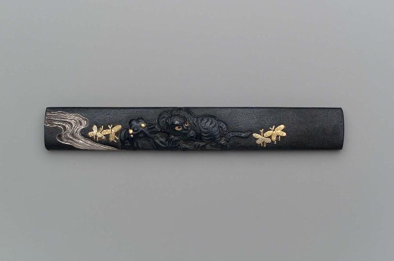 Kozuka with design of tiger, plants and river