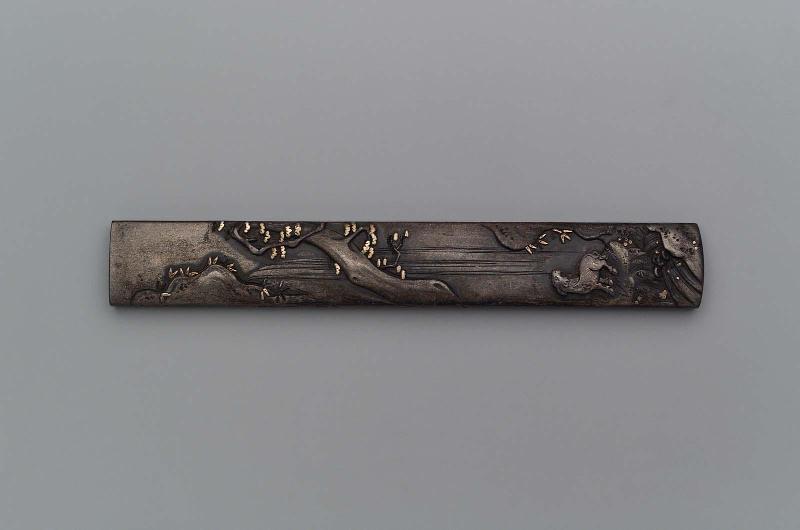 Kozuka with design of goat on a crag by a waterfall