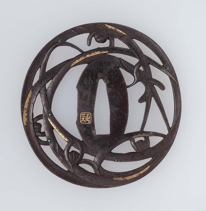 Tsuba with design of orchids and reeds
