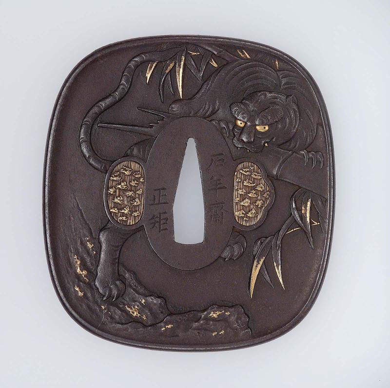 Tsuba with design of tiger and bamboo