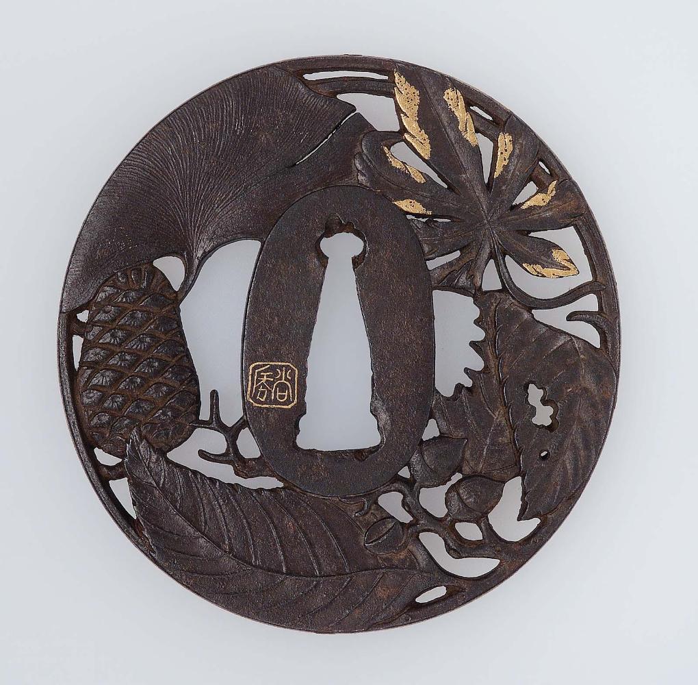 Tsuba with design of oak, gingko and maple leaves and pine-cones