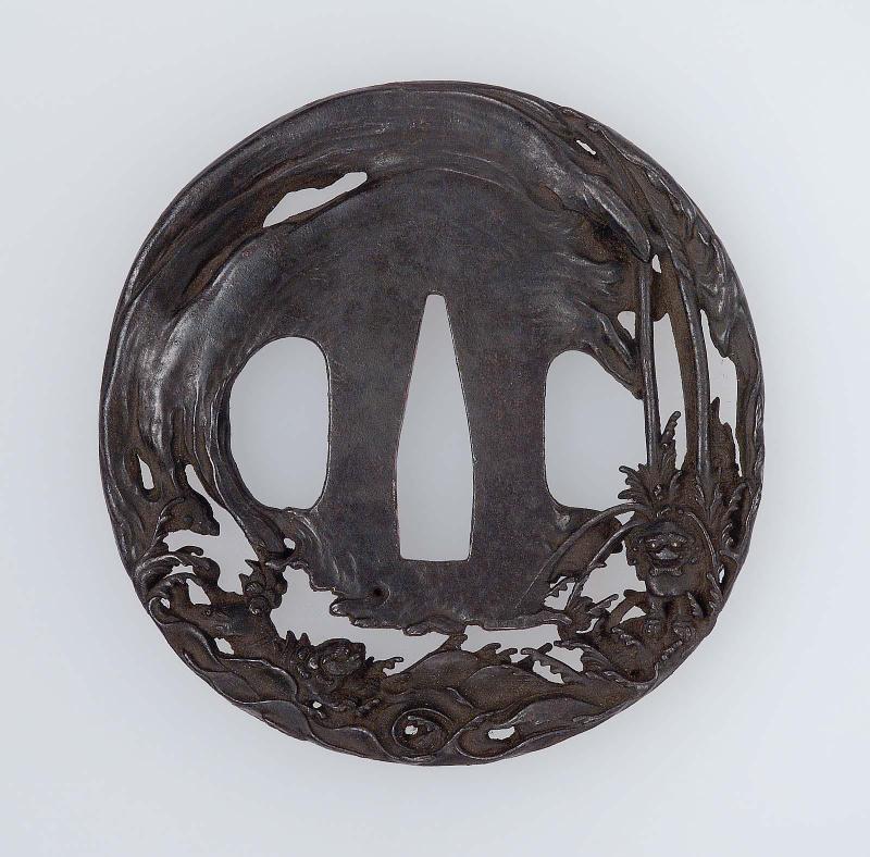 Tsuba with design of shishi under a waterfall and young