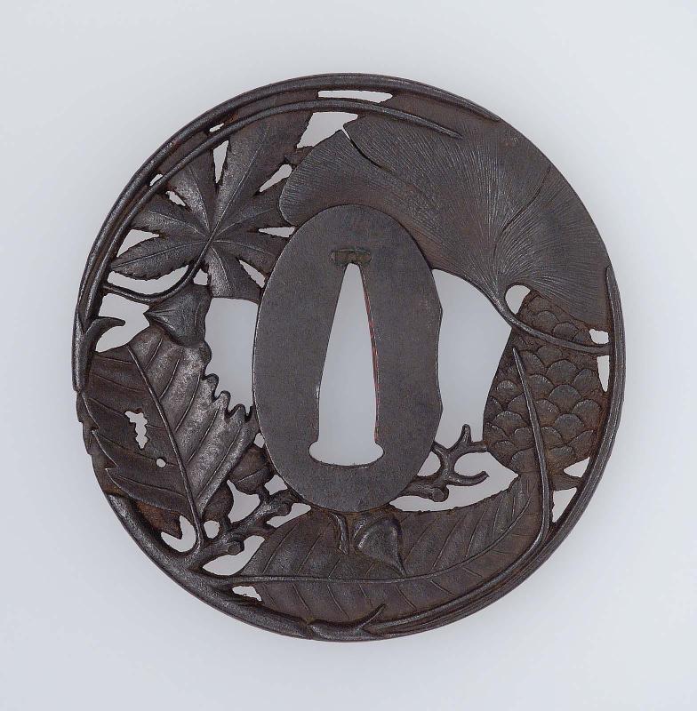 Tsuba with design of oak, gingko and maple leaves and pine-cones