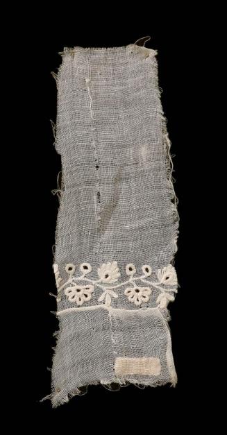 Fragment of embroidered white muslin