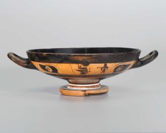 Drinking cup (kylix) depicting a man and a warrior-acrobat