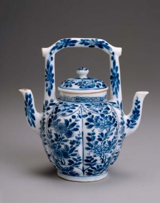 Double-spouted melon-shaped ewer with blue-and-white decoration of flower scrolls