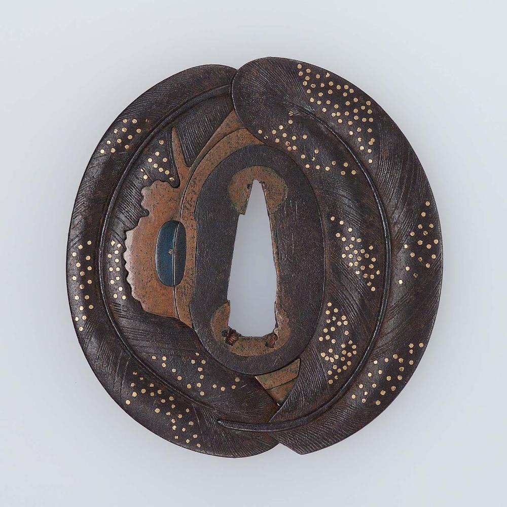 Tsuba in the form of two curved feathers