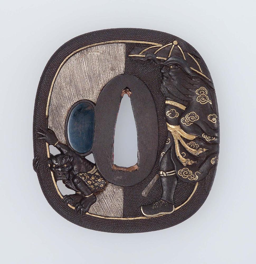 Tsuba with design of Shoki in pursuit of an oni