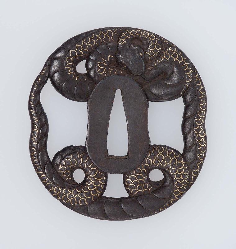 Tsuba in the form of a snake coiled around the seppadai