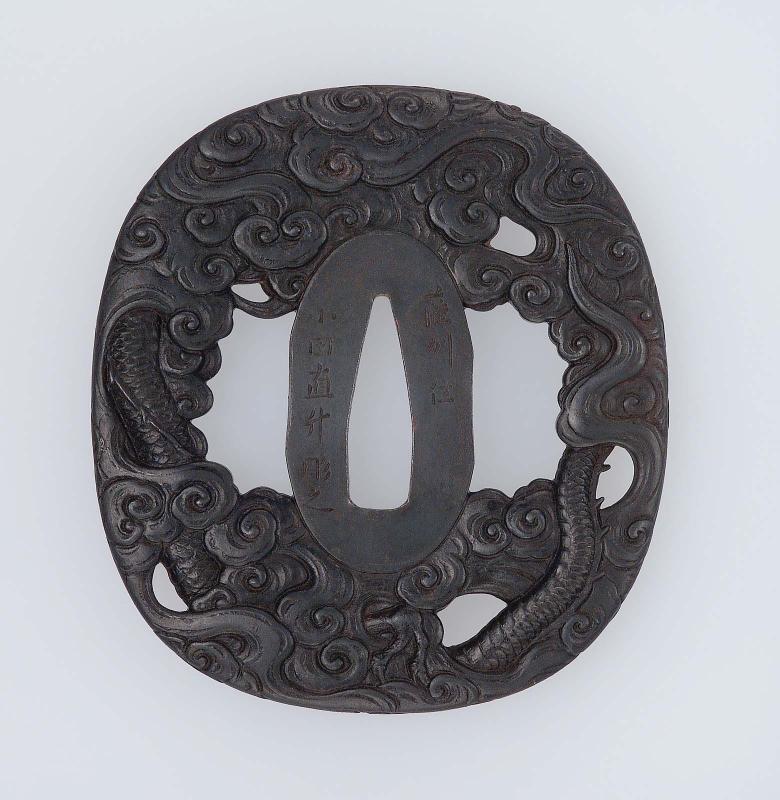 Tsuba with design of dragon and clouds